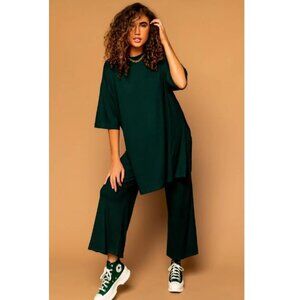 Dressed in LALA Lex Ribbed Playsuit in Emerald